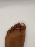 Crowned toe ring