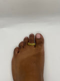 Golden toe ring