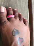 Pink pinup toe ring